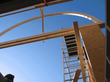 Maison contemporaine en bois - charpente en plein cintre